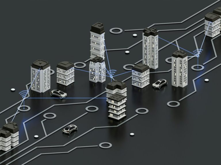 Stadtmodell mit moderenen Gebäuden und vernetzten Straßen.